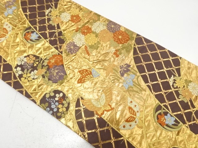 Bag belt with woven pattern of butterflies, chrysanthemums, and irises in a row